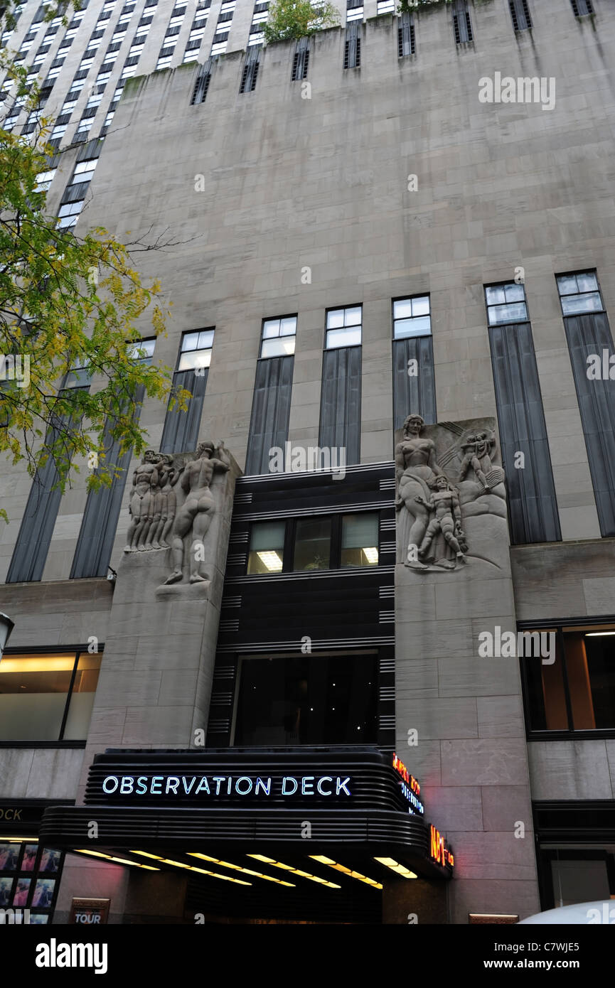 Heroic-sized limestone sculptures Radio Broadcasting, neon Observation Deck entrance, GE Building, West 50th Street, New York Stock Photo