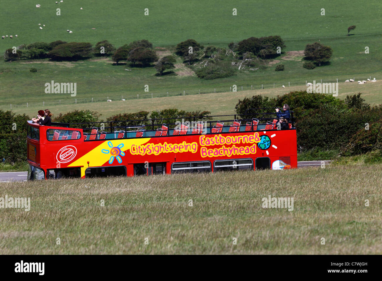 Eastbourne and Beachy Head open topped double decker sightseeing tour bus near Beachy Head , East Sussex , England Stock Photo