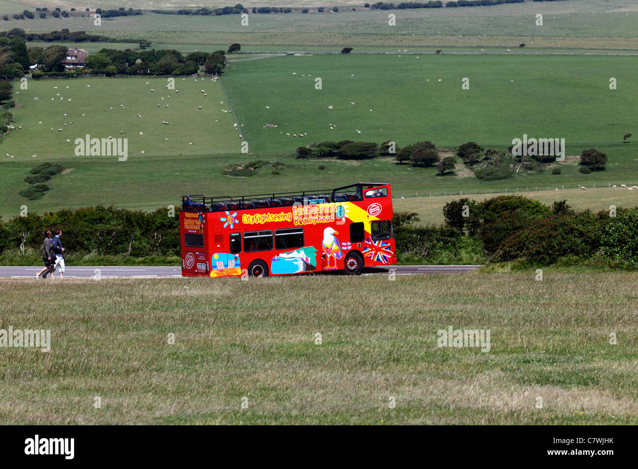 Eastbourne and Beachy Head open topped double decker sightseeing tour bus near Beachy Head , East Sussex , England Stock Photo