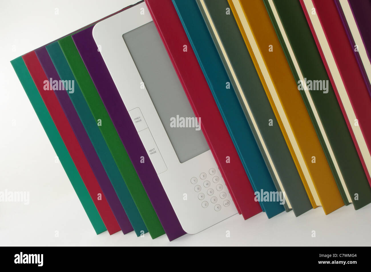 e-book in a row of coloured reading paper books on a white background Stock Photo