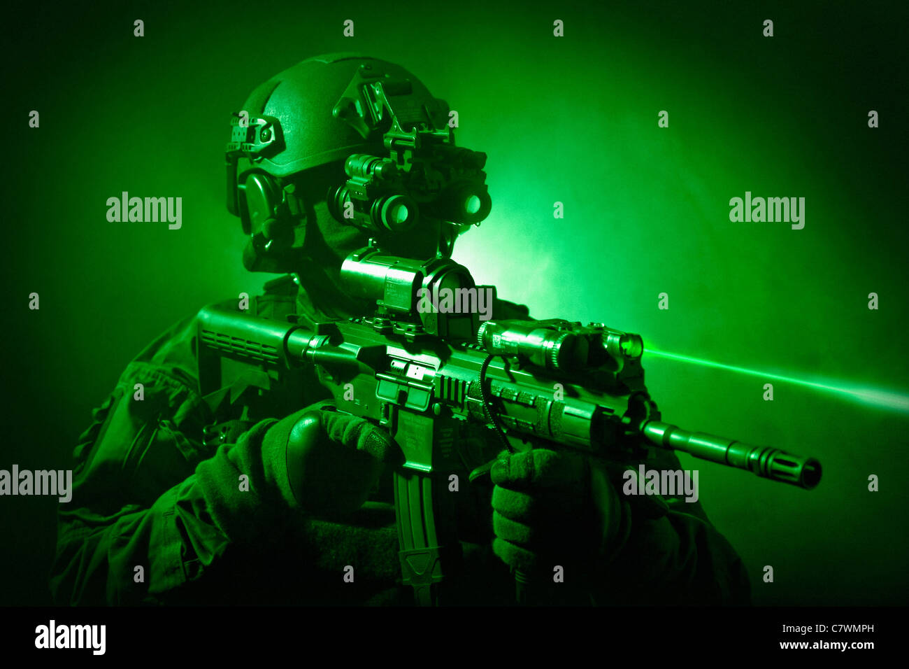 Special operations forces soldier equipped with night vision and an HK416 assault rifle. Stock Photo