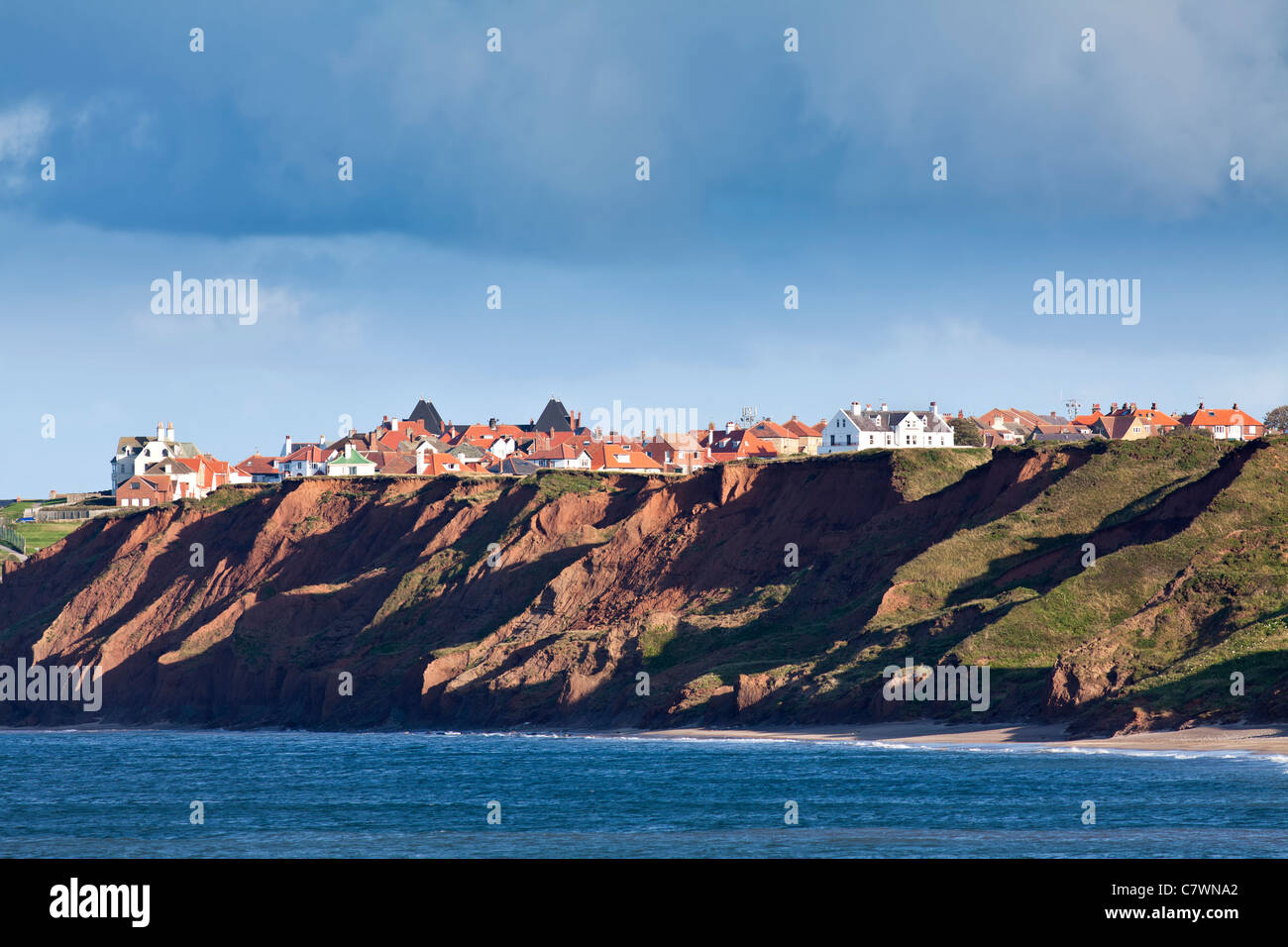View of Whitby from Sandsend, North Yorkshire. Stock Photo