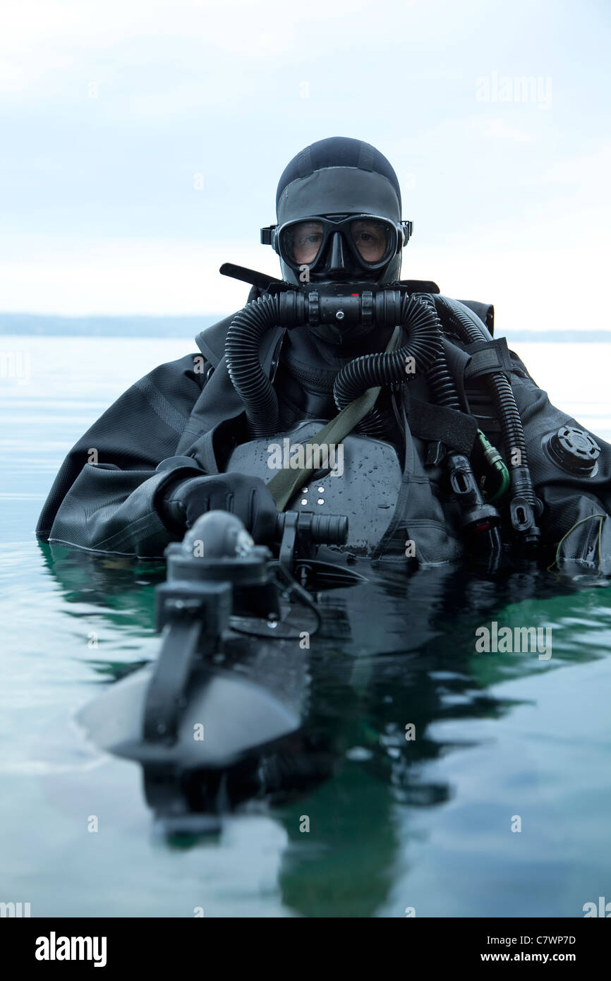 Special operations forces combat diver with underwater propulsion vehicle. Stock Photo