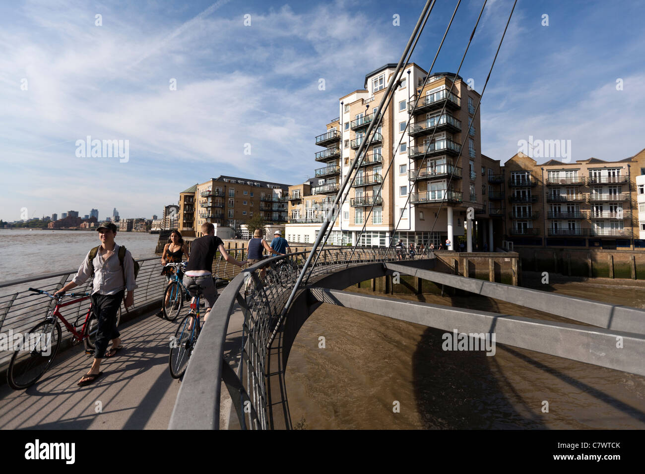 Pedestrian bridge over an inlet of the river Thames, Tower Hamlets, London, UK Stock Photo