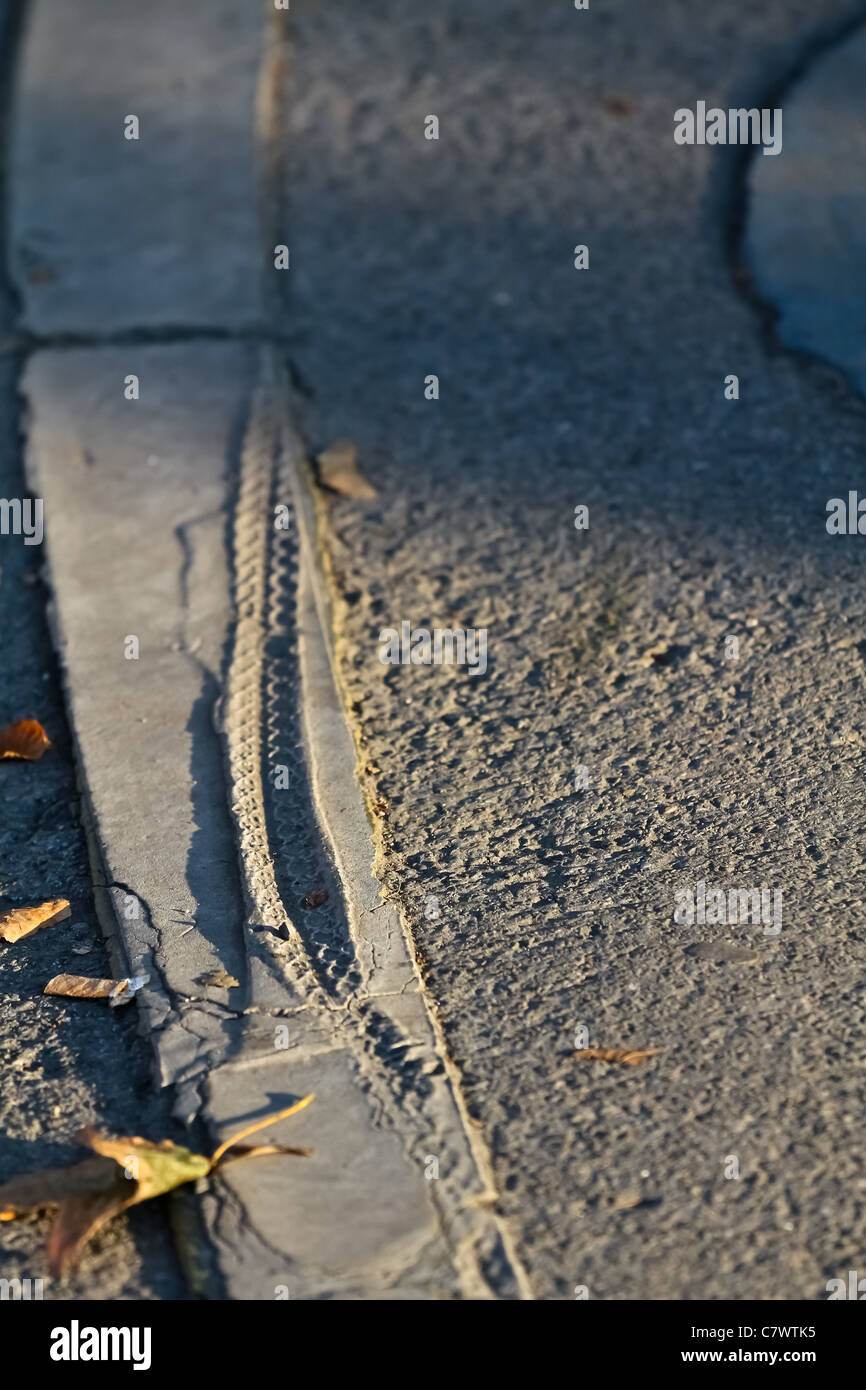 Careless traces of a bike on a marking Stock Photo