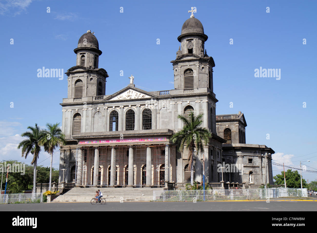 Managua Nicaragua,Santiago of Managua Cathedral Catholic,church,religion,ruin,earthquake damage,tower,dome,cross,facade,fence,plaza,bicycle,bicycling, Stock Photo
