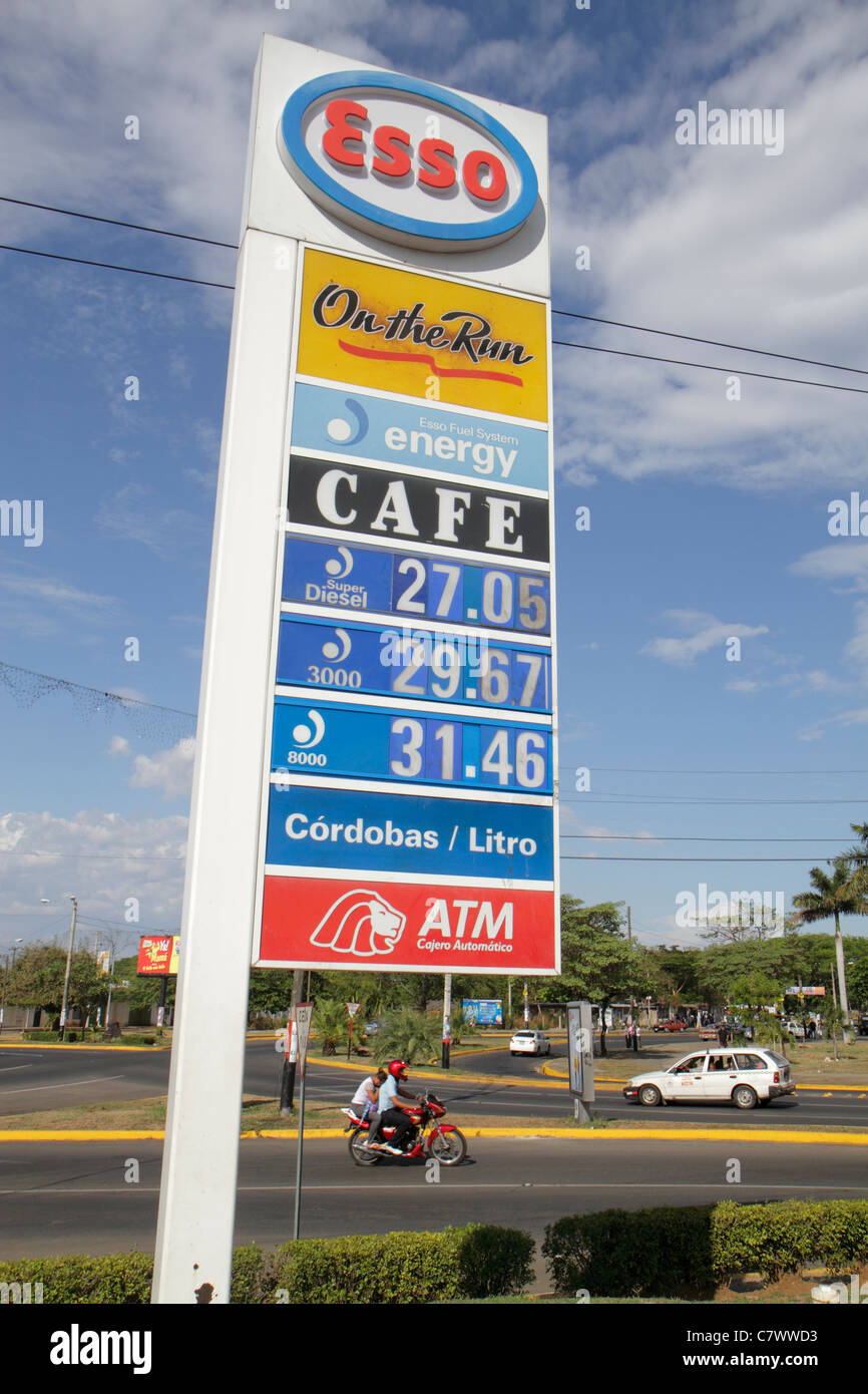 Managua Nicaragua,Calle Colon,street scene,Esso,trade name,Exxon Mobil,multinational company,petrol,filling station,gas station,fuel,sign,price,On the Stock Photo
