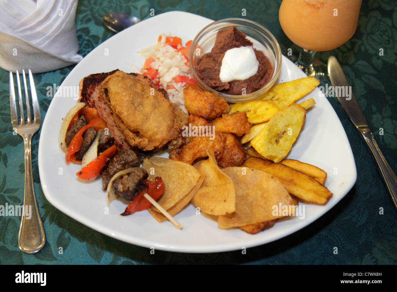 Managua Nicaragua,Los Girasoles,restaurant restaurants food dining cafe cafes,dining,typical food,plate,dish,dinnerware,fork,beef,plantain,tortilla ch Stock Photo