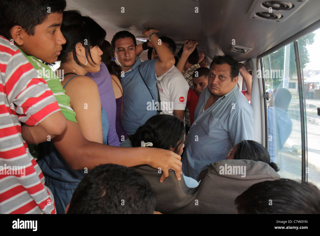Managua Nicaragua,bus,coach,microbus,Hispanic man men male adult adults,woman female women,boy boys,kid kids child children youngster,male,teen teens Stock Photo