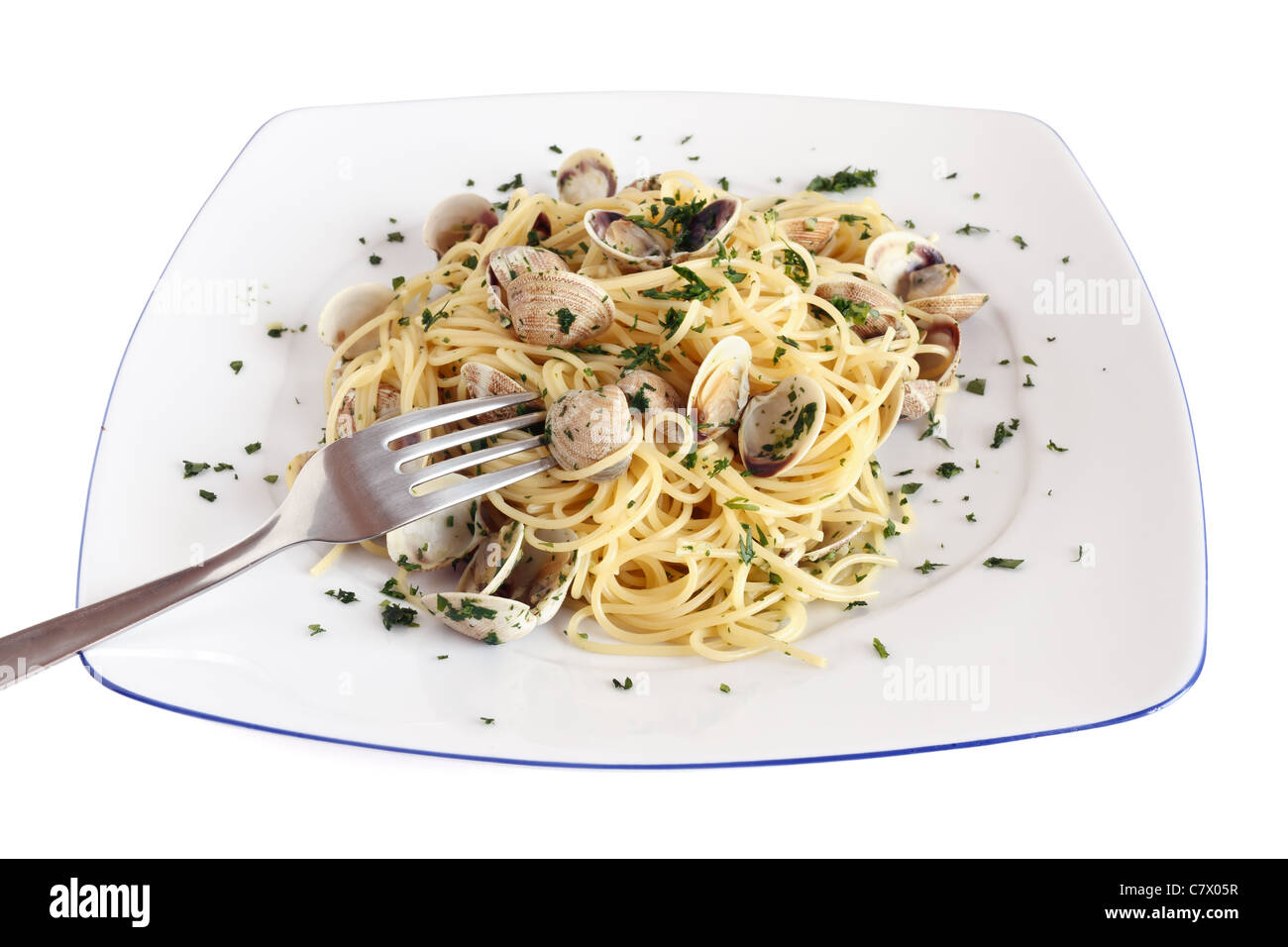 dish of spaghetti with clams and fork isolated with clipping path Stock Photo