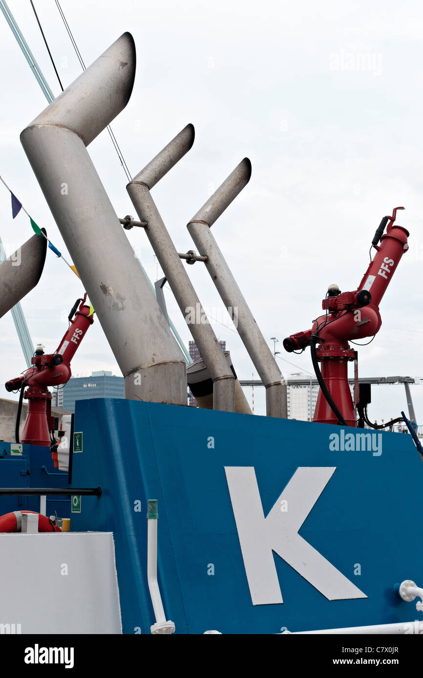 Exhaust pipes of a combined tugfire boat in the Port of Rotterdam