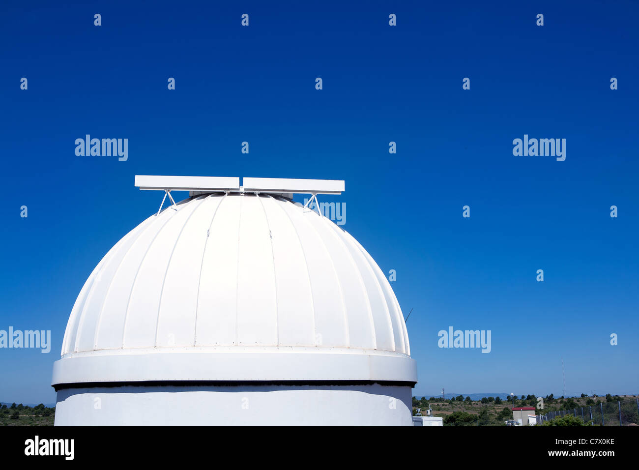 astronomical observatory dome in blue sky daylight Stock Photo
