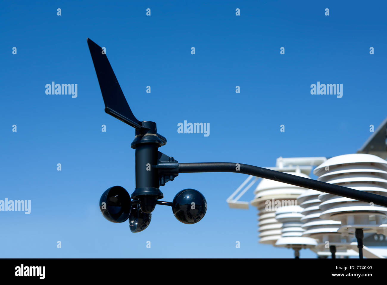 anemometer vane in weather station under blue sky Stock Photo