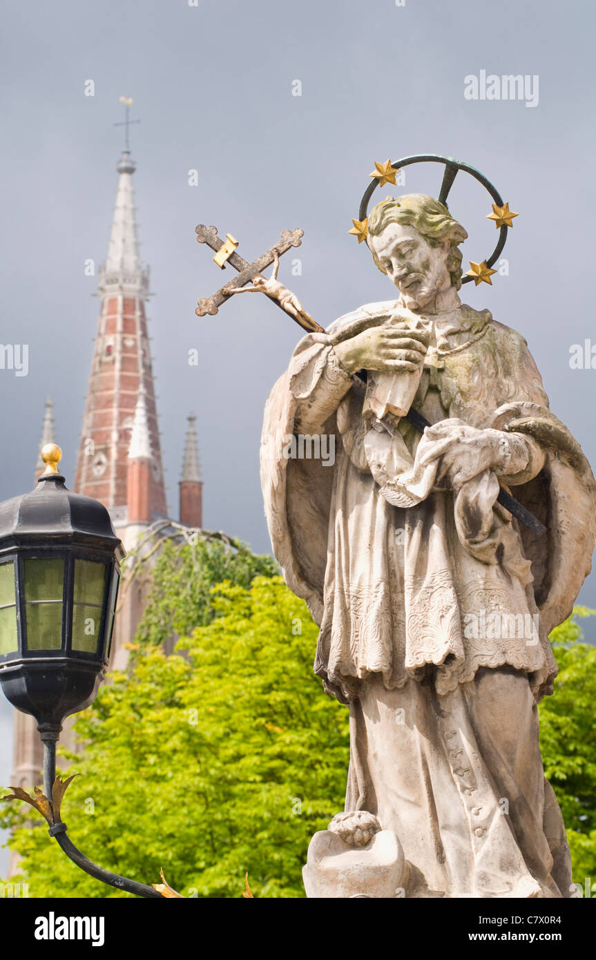 Statue of Saint John Nepomuk near the Church of Our Lady in Bruges, Belgium Stock Photo