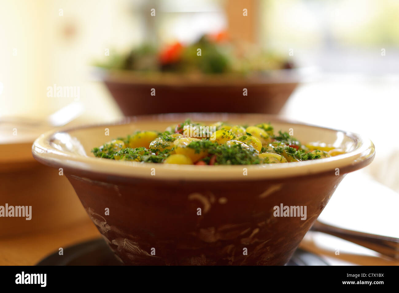 Bowls of potato salad Stock Photo