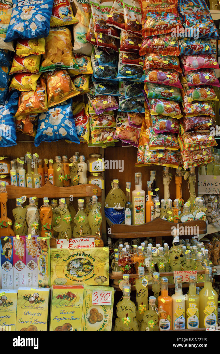 Bottles of Limoncello liquor and candies displayed for sale Sorrento