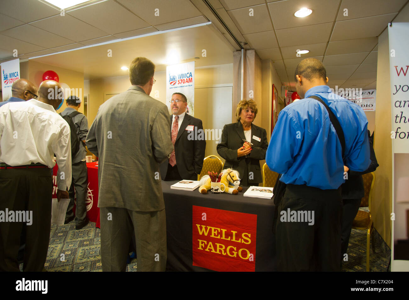 Job seekers attend a job fair in midtown in New York on Friday, September 30, 2011. ( © Frances M. Roberts) Stock Photo