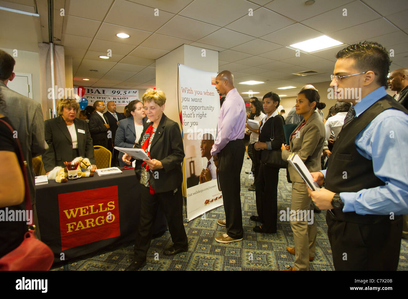Job seekers attend a job fair in midtown in New York on Friday, September 30, 2011. ( © Frances M. Roberts) Stock Photo