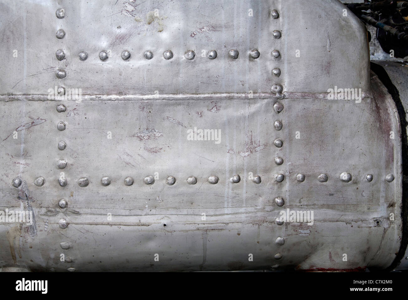 Aluminium riveted metal fuselage texture Stock Photo