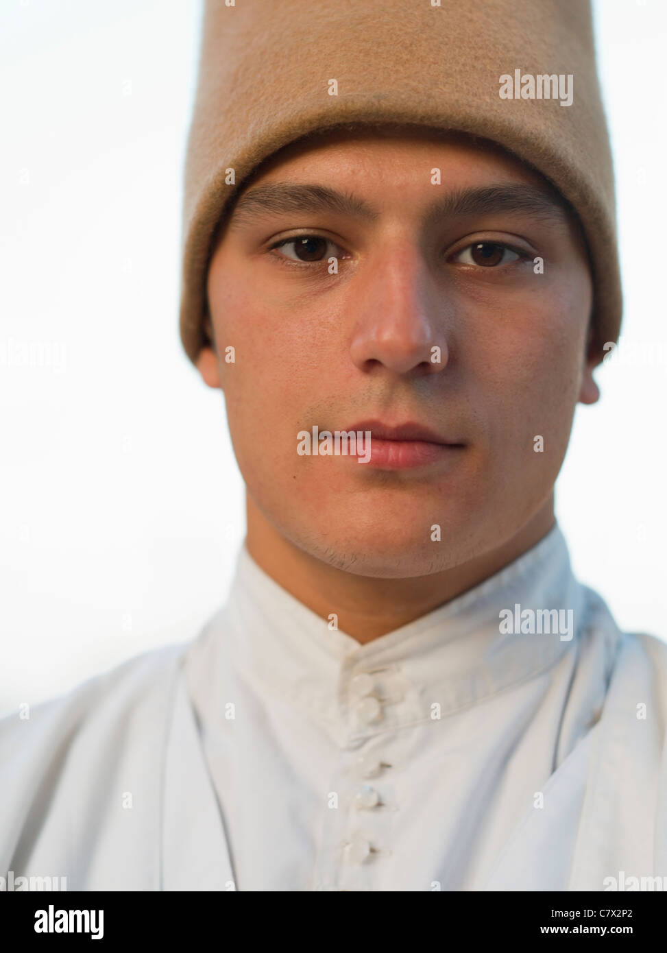 Sufi Whirling Dervish Dancer Istanbul, Turkey. Wearing sikke hat Stock Photo