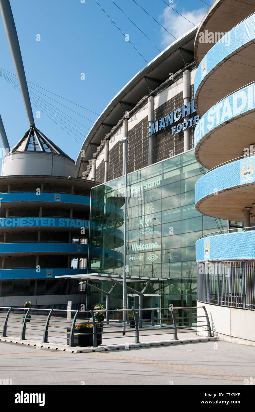 Spiral access ramps and supporting beam and cables at an entrance to the City of Manchester Stadium, Manchester, England, UK Stock Photo