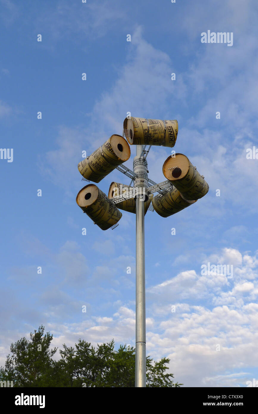 Unusual birdhouses made from builders concrete forming tubes Stock Photo