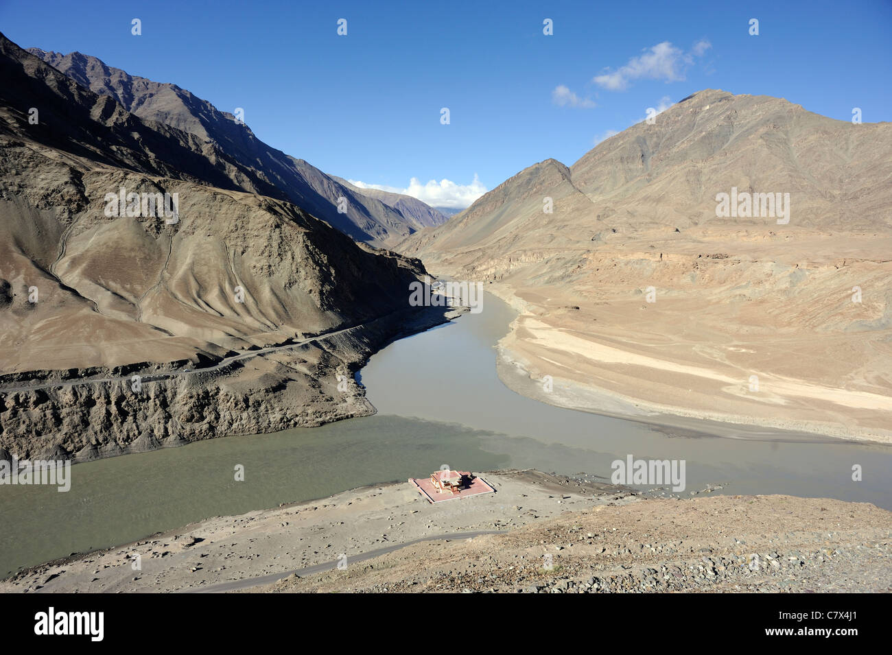 The confluence of the Zanskar, River and the Indus near Nimu. The Indus comes in from the left. Stock Photo
