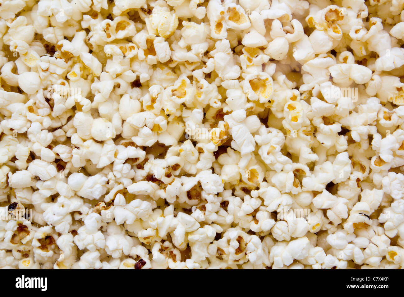 Corn popcorn texture view from glass in cinema shop Stock Photo