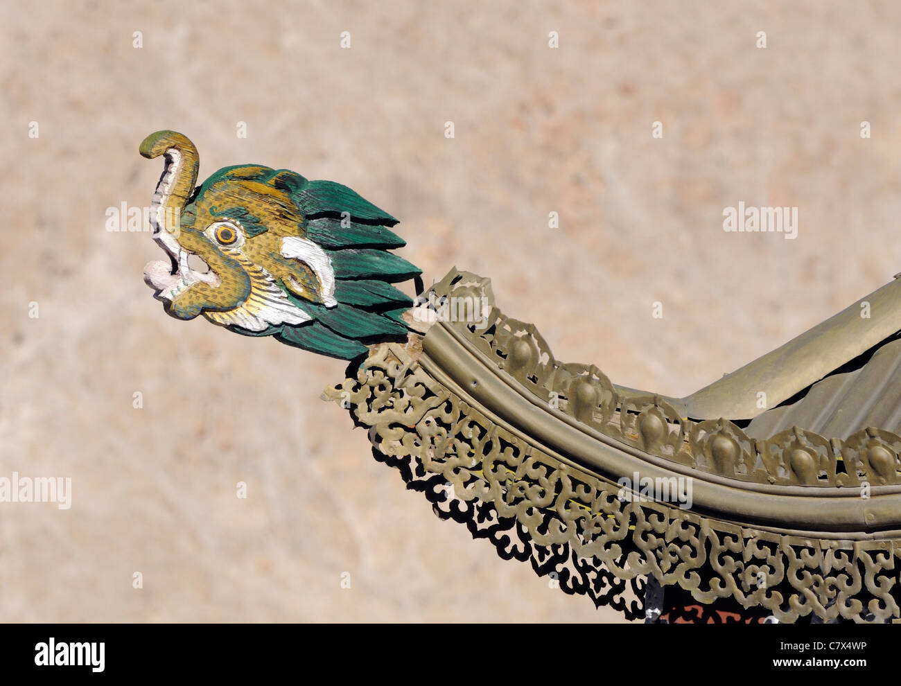 A makara, a water or sea monster, used as a finial on the roof of a building at the Shanti Stupa. Leh, Ladakh Stock Photo