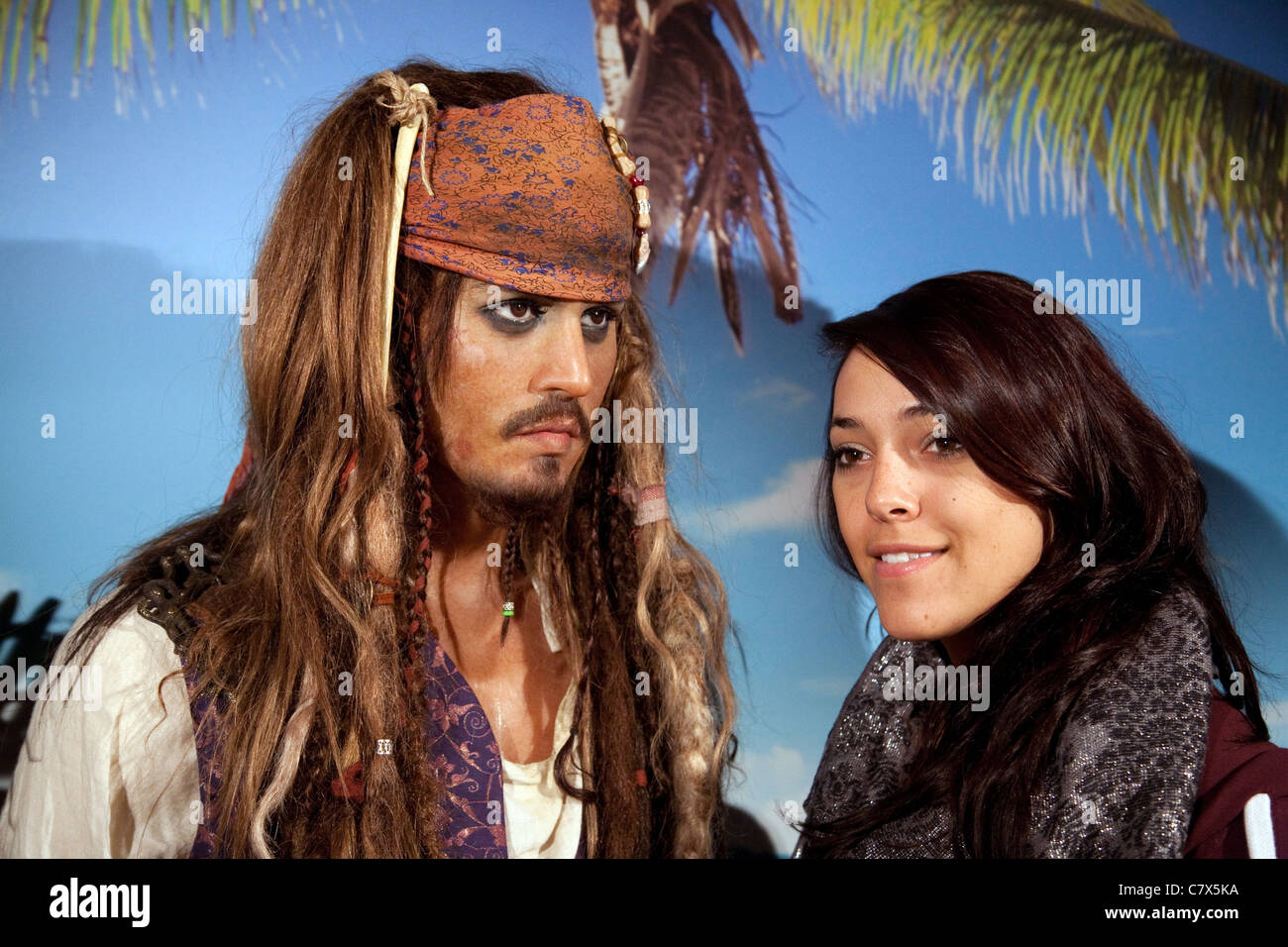 Teenage girl having her photo taken with waxwork of Johnny Depp as Captain Jack Sparrow, Madame Tussauds waxworks, Washington DC Stock Photo