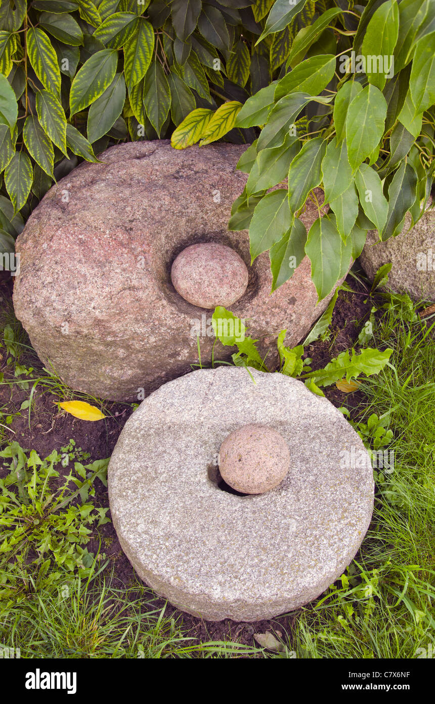 Burr with hole and stone in it and other big stone. Stock Photo