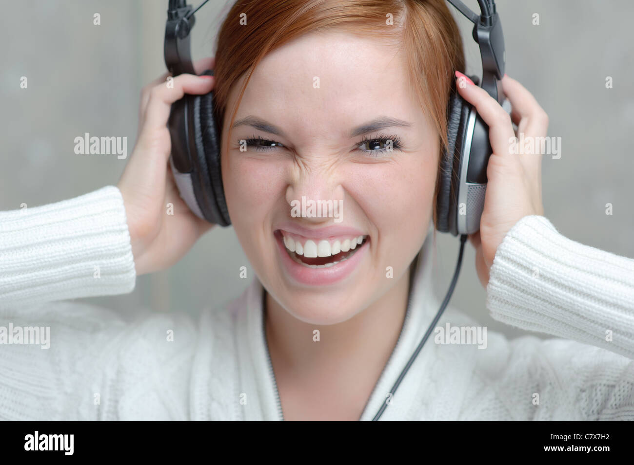 Portrait of beautiful girl listening headphones Stock Photo