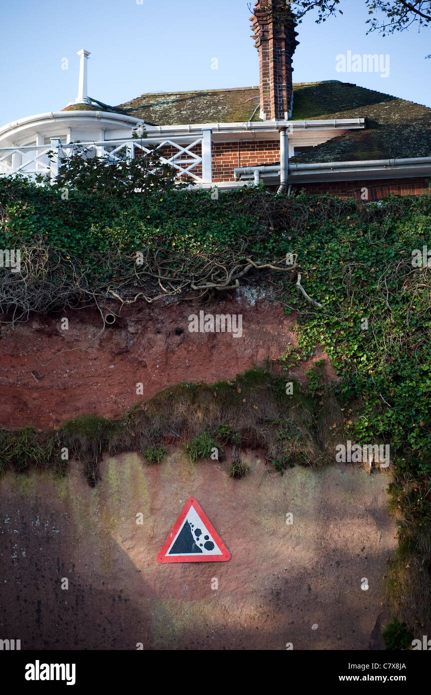 Danger Sign showing fallen rocks on coastline of Torquay Devon, england ...