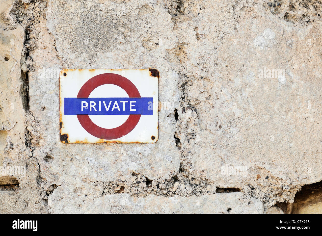 Grunge private property sign on wall in Mdina, Malta Stock Photo
