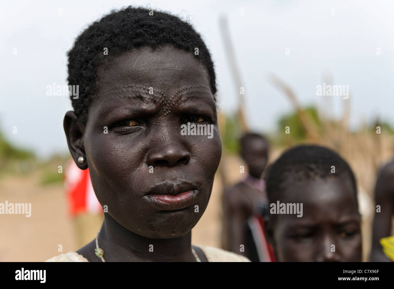 Dinka woman with decorative scars on her forehead, Luonyaker, Bahr el Ghazal, South Sudan. Stock Photo