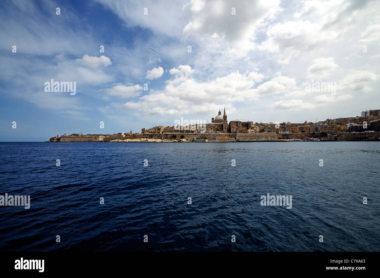 A view of the Valletta skyline over Marsamxett Harbour from Sliema, Malta. Stock Photo
