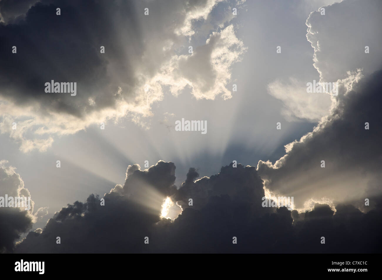 Rays of light shining through clouds, Luonyaker, Bahr el Ghazal, South Sudan. Stock Photo