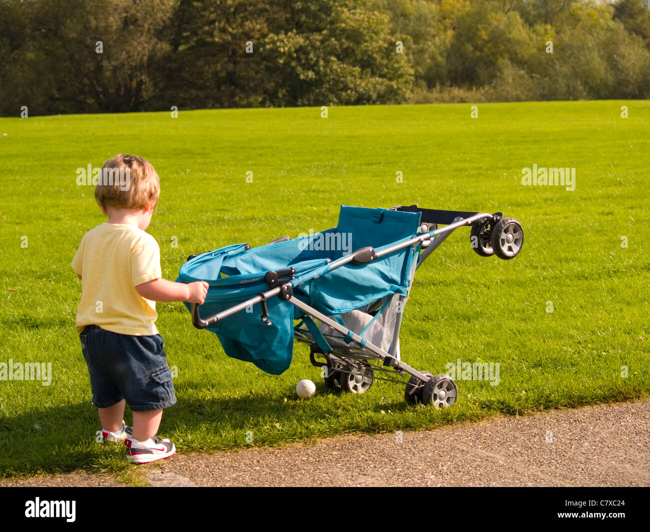 Determined To Play With His Push Chair Hi res Stock Photography And