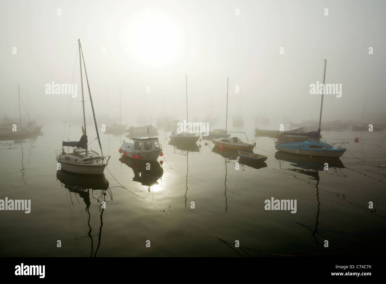 Early morning sea mist in Penzance harbour, Cornwall UK. Stock Photo