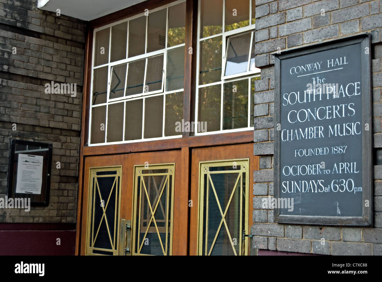 entrance to conway hall, red lion square, london, england, with notice for forthcoming south place chamber music concerts Stock Photo