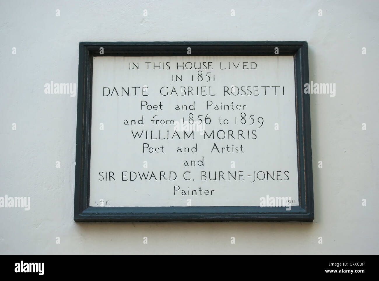 plaque on a former home of painters dante gabriel rossetti and edward c burne-jones, and writer and artist william morris Stock Photo