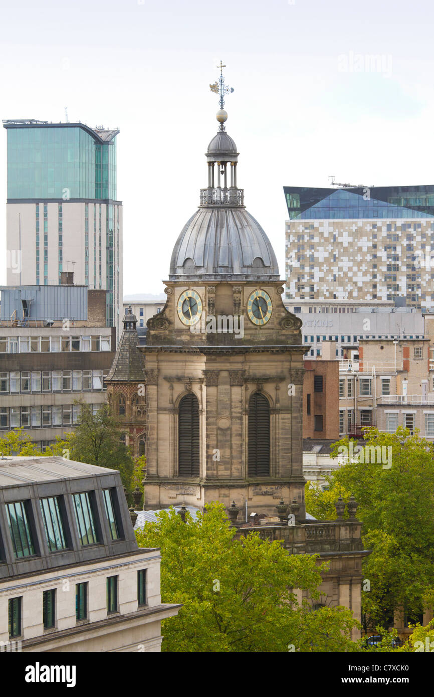 St. Philips cathedral in Birmingham. England, along with The Cube building in the rear. Stock Photo