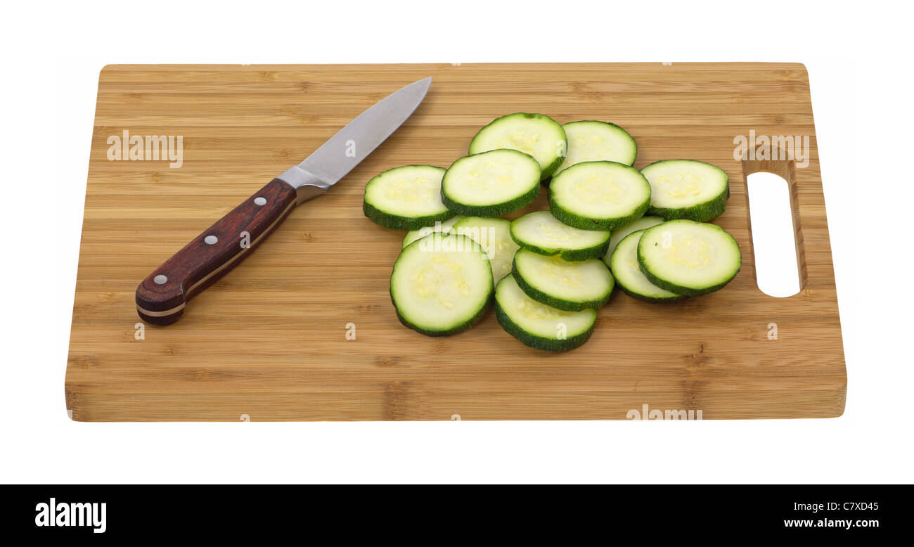 Zucchini on cutting board with knife Stock Photo