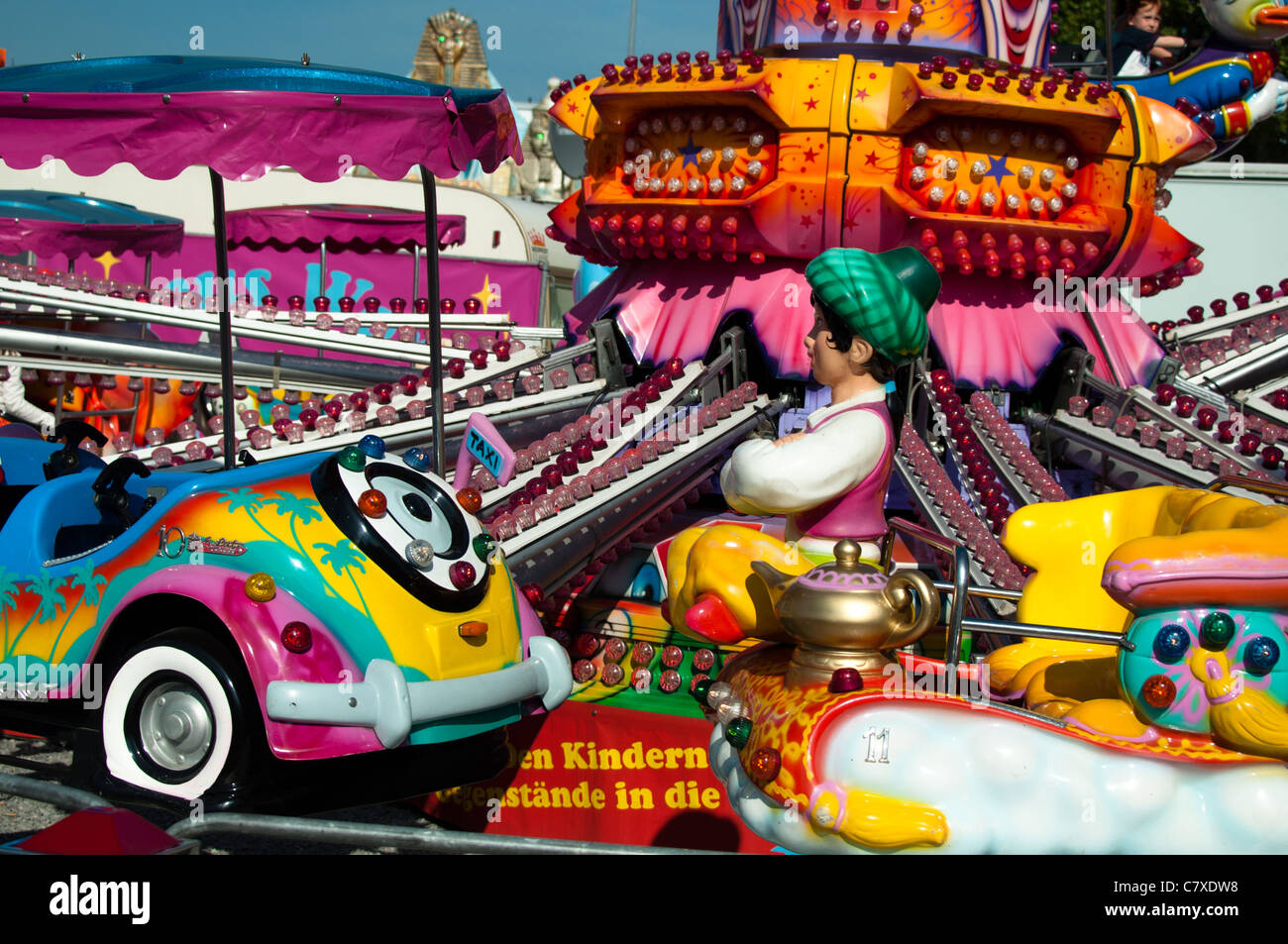 Very colorful and artistic decoration of a children´s carousel or merry-go-round at the Cannstatter Wasen in Stuttgart. Stock Photo