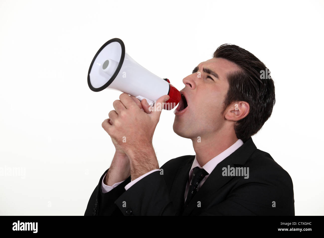 Man yelling into a megaphone Stock Photo Alamy