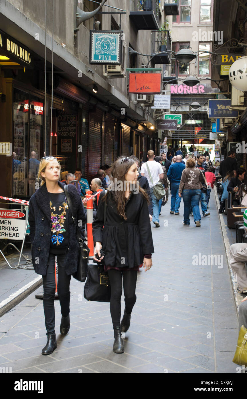 Attractive young women shopping in trendy Centre Place, one of the popular and atmospheric laneways in Melbourne, Australia. Stock Photo