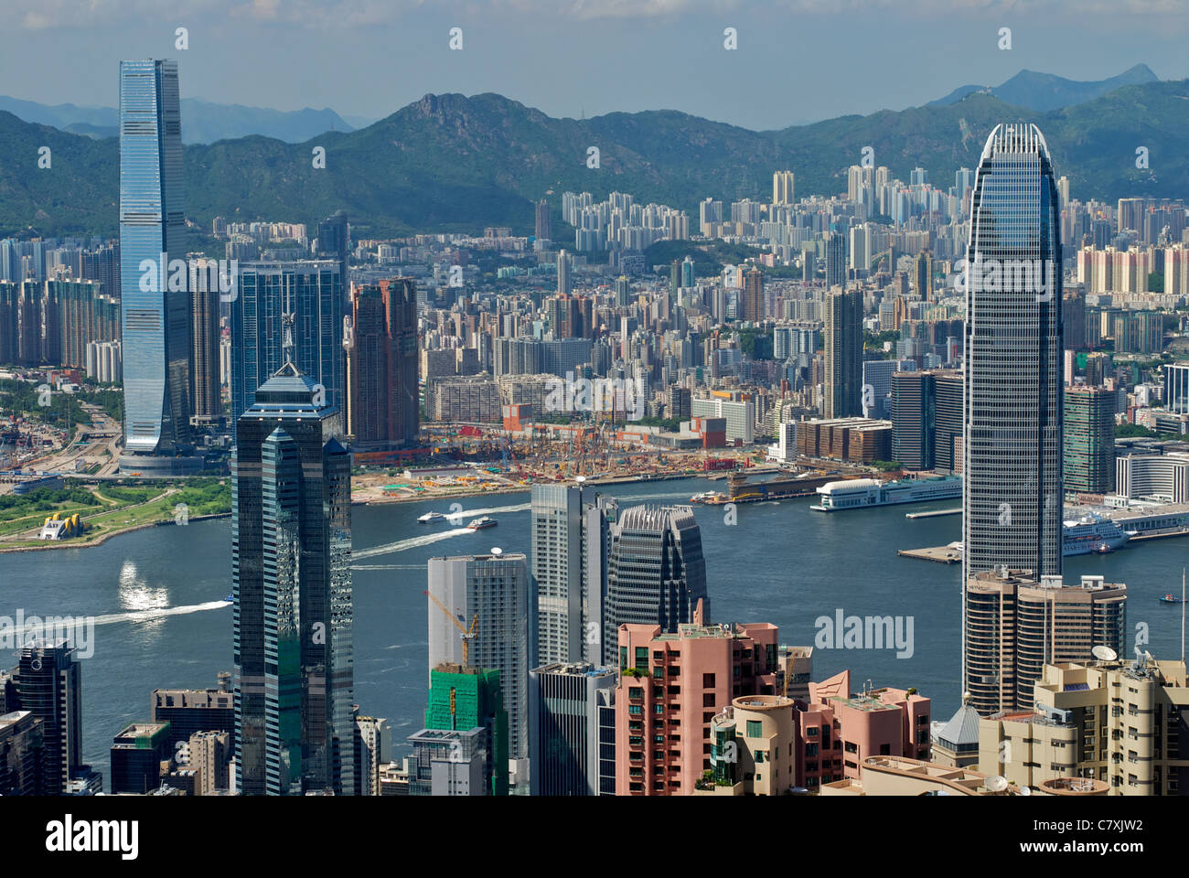 A view across the harbour, International Finance Centre 2 (IFC 2) on the right, with International Commerce Centre (ICC) in West Kowloon on the left. Stock Photo