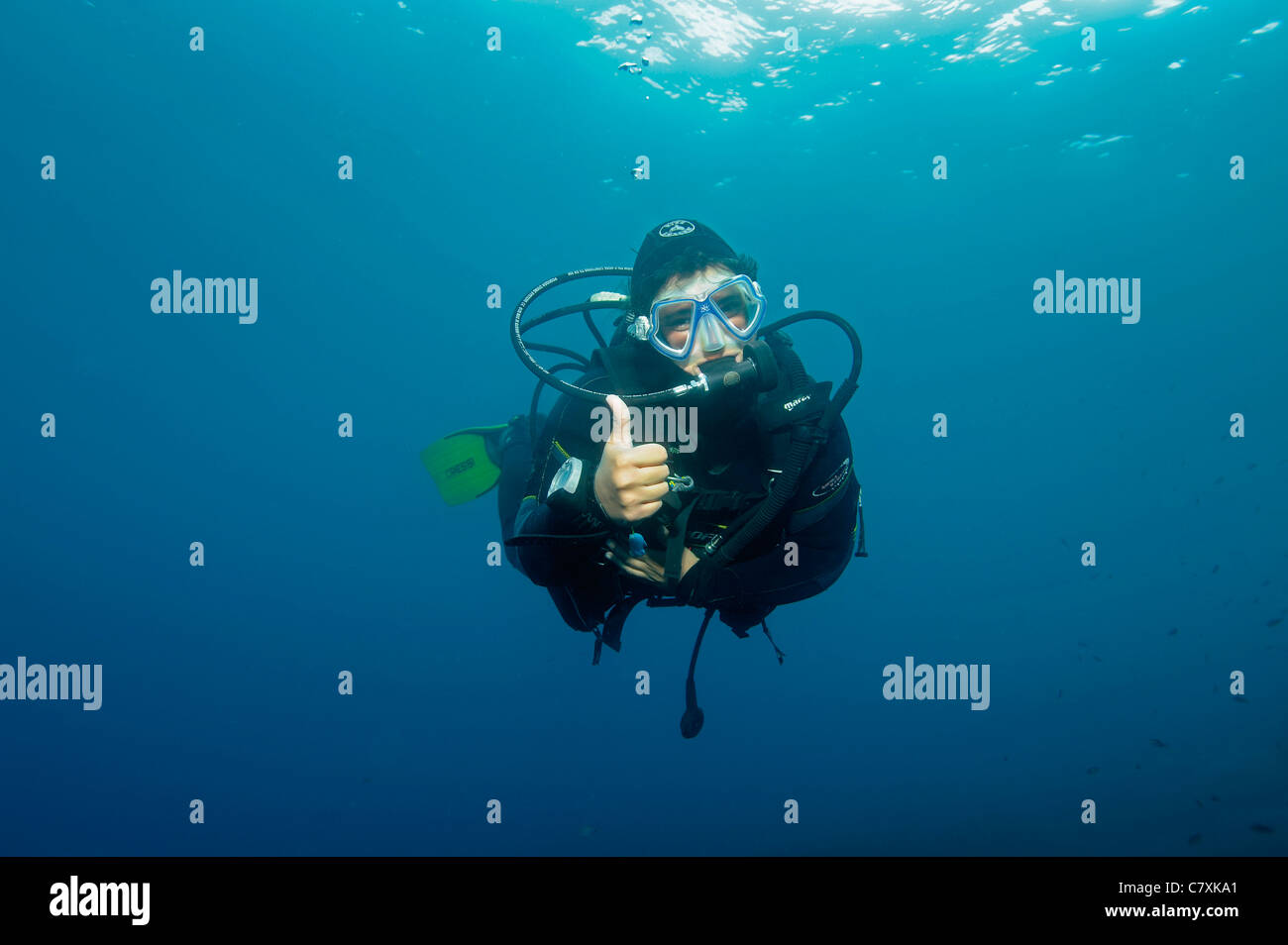 Scuba Diver giving Signal for Ascent Stock Photo