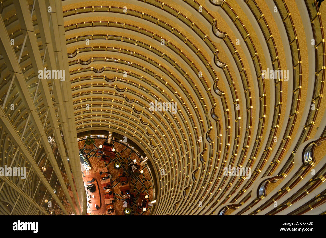 The lobby bar of the Grand Hyatt hotel sits at the bottom of this impressive atrium, located in the Jin Mao Tower. Stock Photo