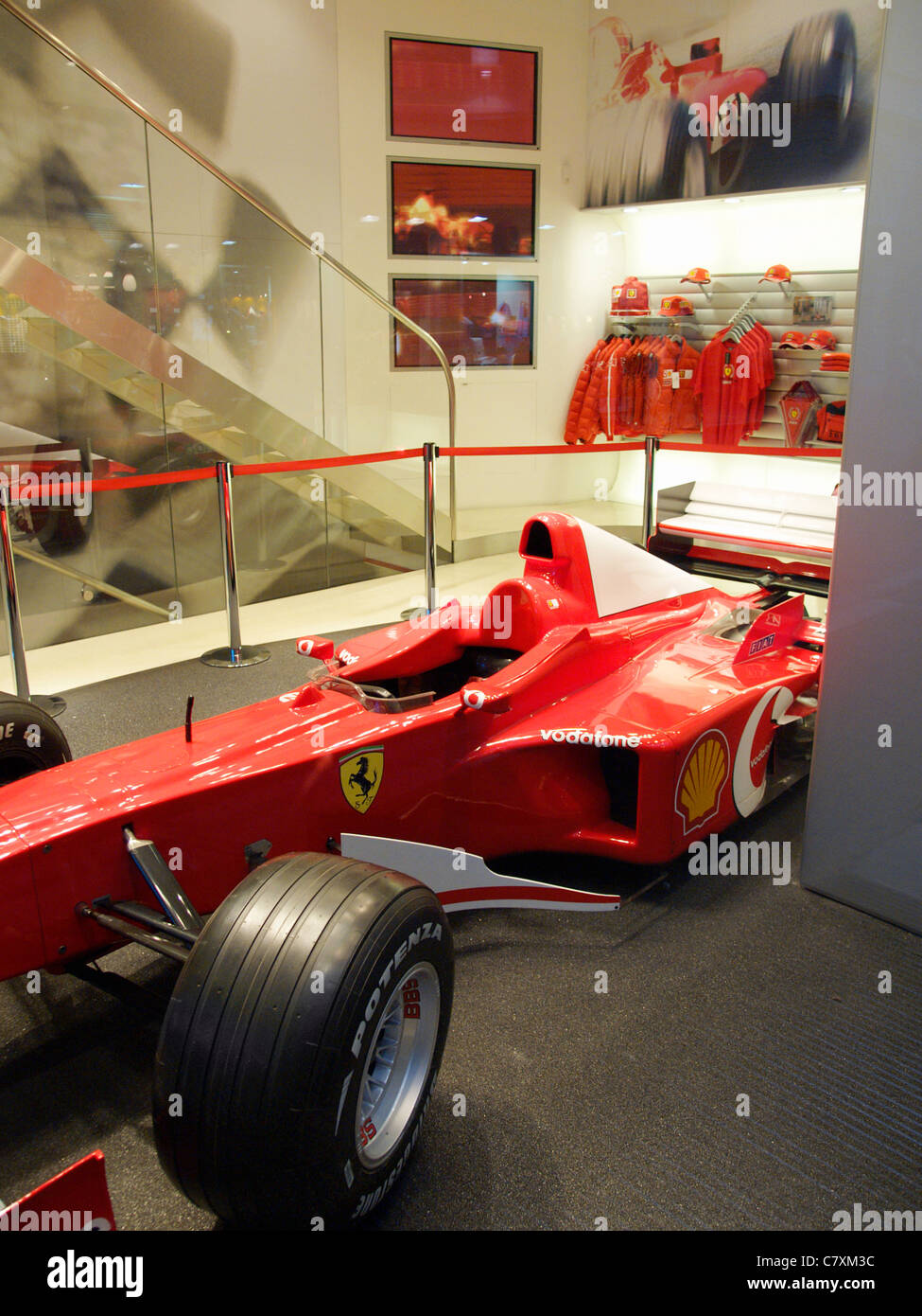 The Ferrari store in Rome, Italy, with a formula one racing car in the shop window Stock Photo